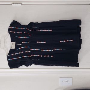 Tiered Black Top with multicolor embroidered lines & ruffle cap sleeves. Size L.